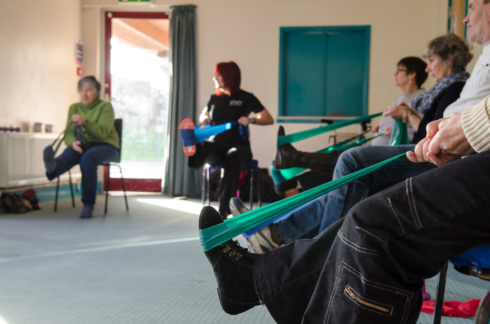 Physical therapy session with resistance bands